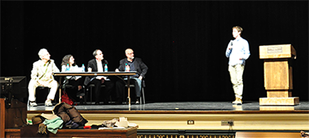 A student gives a 60-second pitch for his book idea during Pitchapalooza at Lincoln Hall Theater.