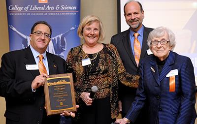 The late Richard Wasson's wife Neva, and his daughter, Sue Bohm, accept his posthumous Quadrangle Award.