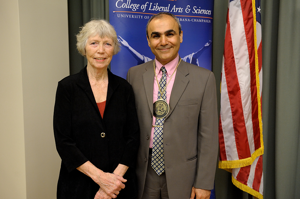 Emad Tajkhorshid, J. Woodland Hastings Endowed Chair in Biochemistry, poses with Tamara T. Mitchell, who, with her late husband, George W. Mitchell III, created the position through a gift to the university. 
