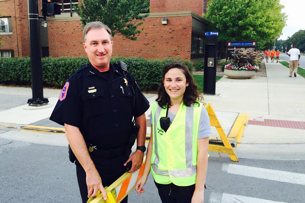 Jeff Christensen and Kasey Karlin, then a member of the Student Patrol, help manage football game traffic. (Photo courtesy of Jeff Christensen.) 
