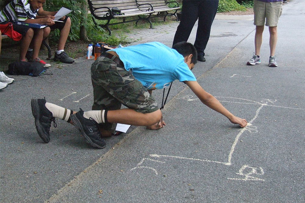 Lessons at the Bridge to Enter Advanced Mathematics program can take children outside the traditional classroom setting. (Photo courtesy of Daniel Zaharopol.) 