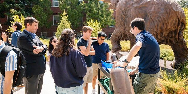 CliMas students gathering outside the Natural History Building to launch a weather balloon.