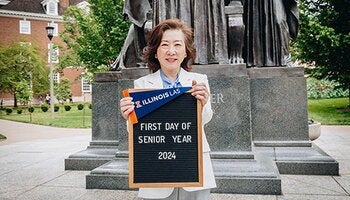 Bonnie Kim standing in front of the Alma Mater statue on her first day of her senior year of college