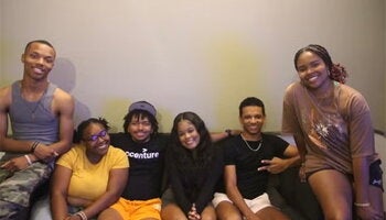 Six students gathered together for a group photo