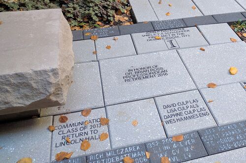 A photo of several pavers in the courtyard of Lincoln Hall
