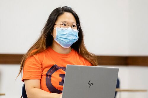 A student works on her computer