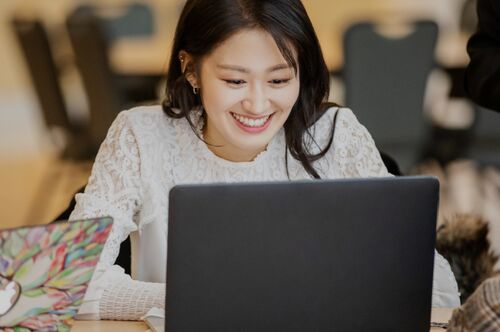 A student works on her computer