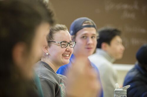 A student smiles during class