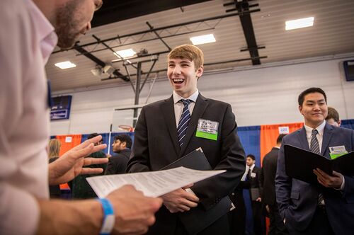 A student participates in a career fair