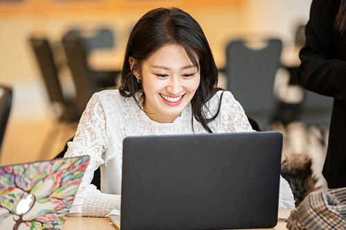 A student at her computer