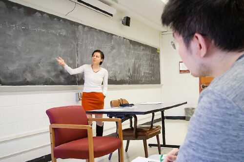 Students doing math in a classroom