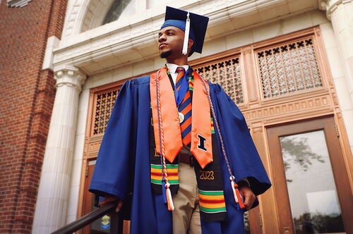 An LAS graduate outside Lincoln Hall