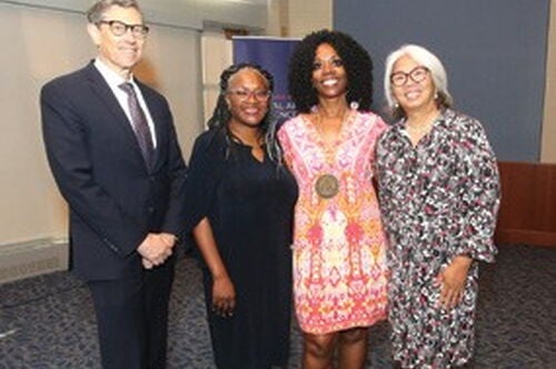 Professors honored with named positions pictured with Venetria K. Patton
