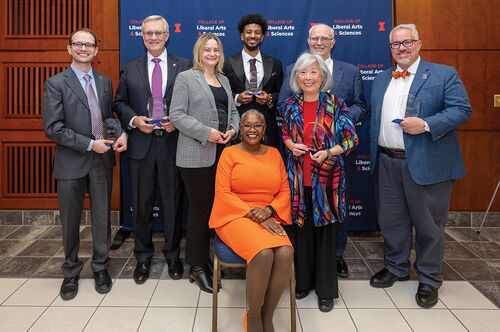 2024 Alumni honorees pose with Dean Venetria K. Patton (center) at the event. From left: Daniel Heller, John Anderson, Lisa Monteggia, Venetria K. Patton, Ernest Crim III, Susan Morisato, Tom Remec, and Ruben Mesa. (Group and awardee event photos by Darrell Hoemann)