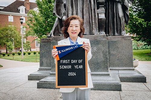 Bonnie Kim standing in front of the Alma Mater statue on her first day of her senior year of college