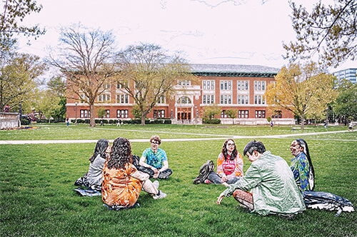 Illustration taken from a photograph of undergraduate students sitting on the grass on the Main Quad facing Lincoln Hall