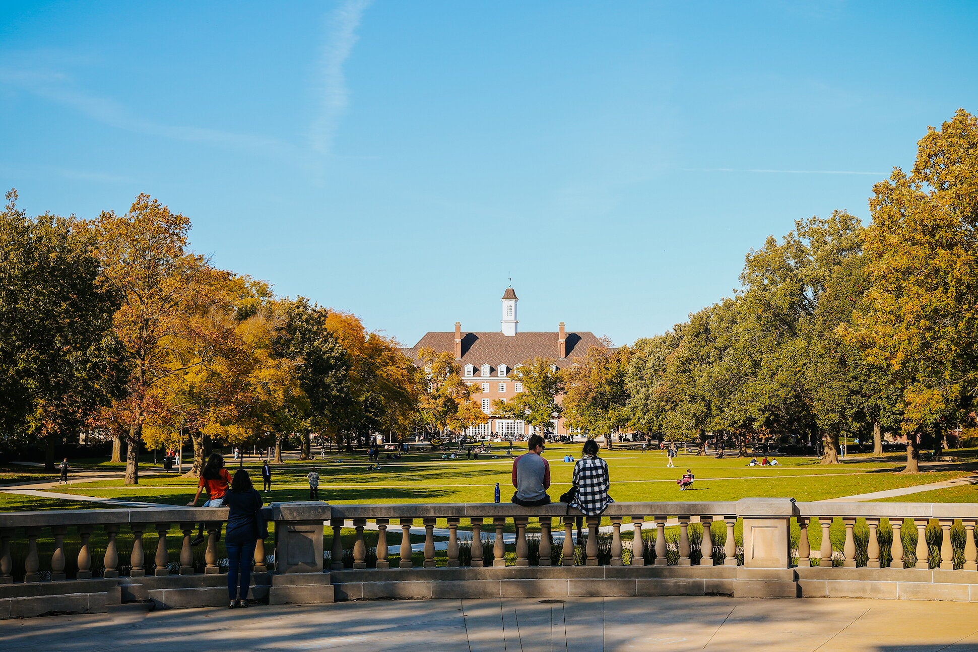 Students sit on the Main Quad