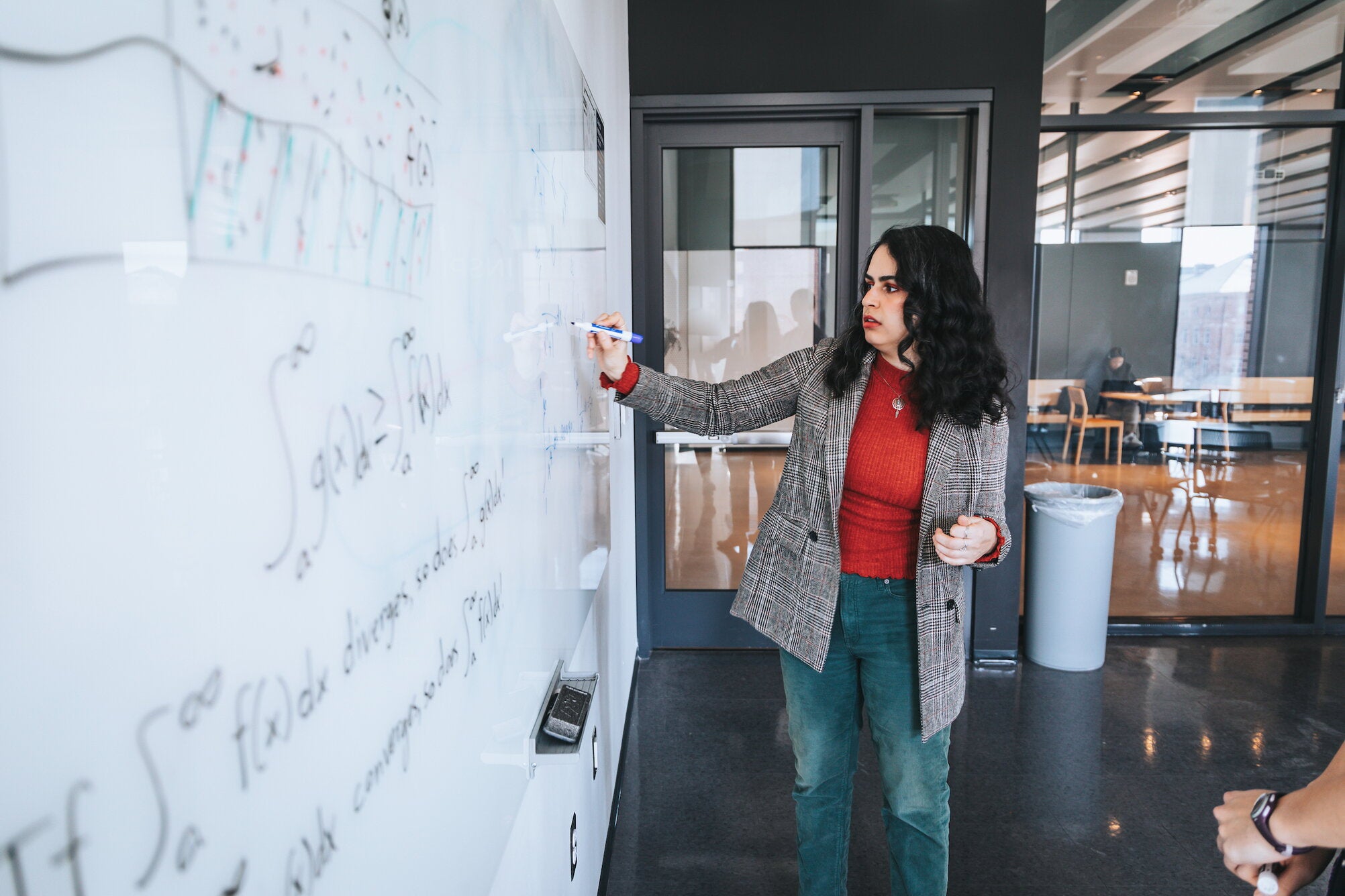 Solving a problem on a blackboard 