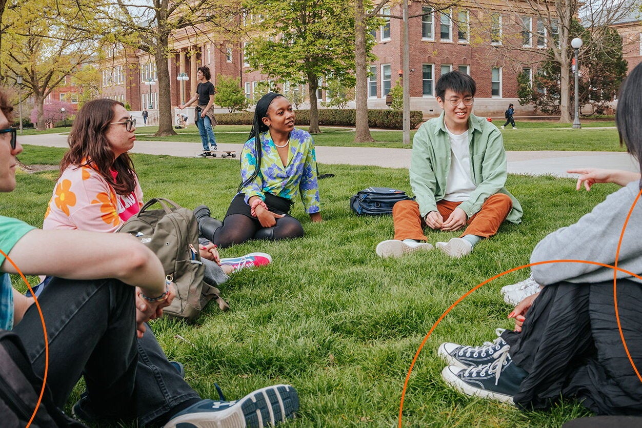 students in a group on the quad