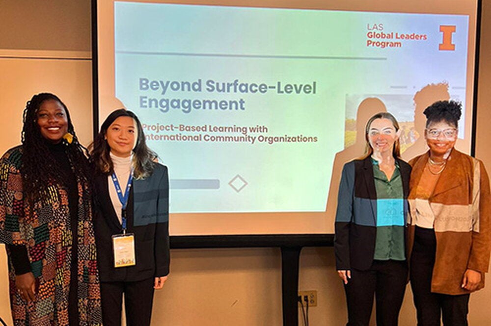 Pictured is Lica with Erin, Nikia, and Ana at the Global Student Leadership Summit