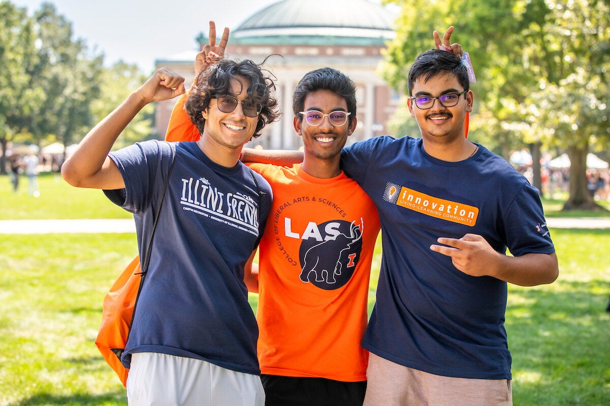 students posing on the quad