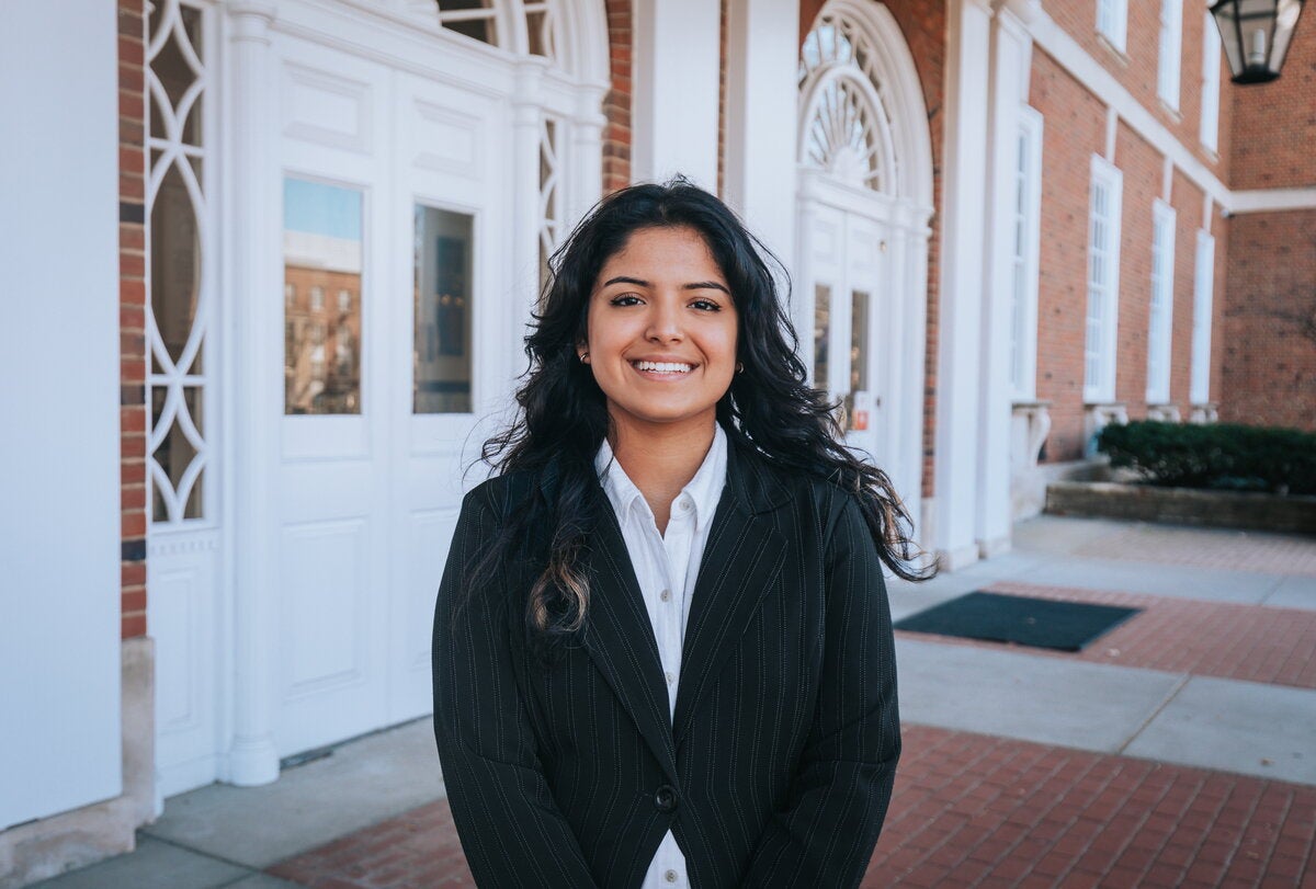 Student standing in front of the Green Street side of the Illini Union.