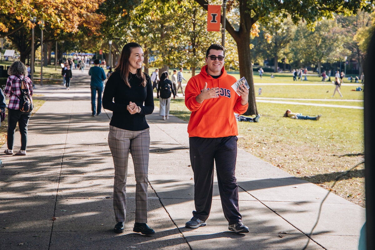 Karle Flanagan and student having a conversation on the Main Quad