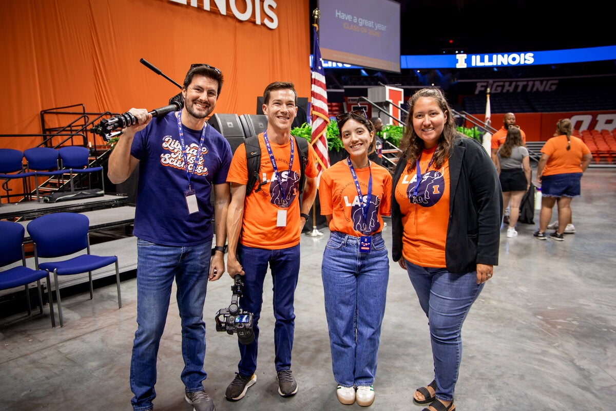 LAS Marcom team with video equipment at State Farm Center.
