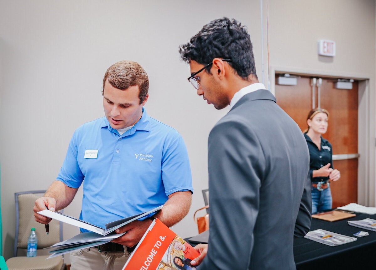 Student connecting with recruiter at Career Fair.
