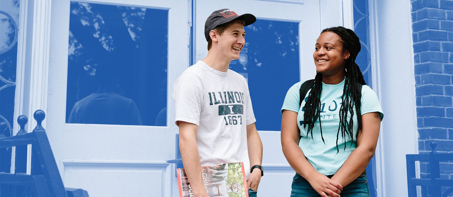 Students talk outside the English Building