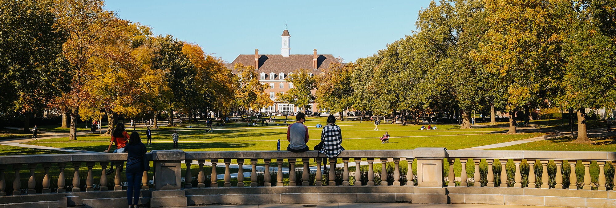 Students sit on the Main Quad