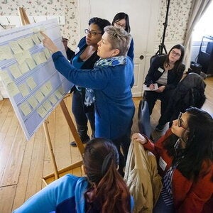 Faculty members working on a project