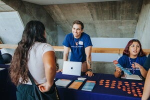 Latina/Latino studies table at LAS Liftoff at State Farm Center