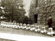 University president Edmund Janes James (1855–1925) poses next to the soon-to-be-installed chime bells