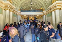 Students in the lobby of Lincoln Hall at Illini Fest for admitted students, Spring 2024