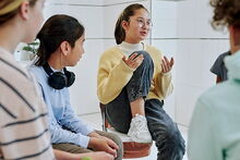 Teenage girls in discussion