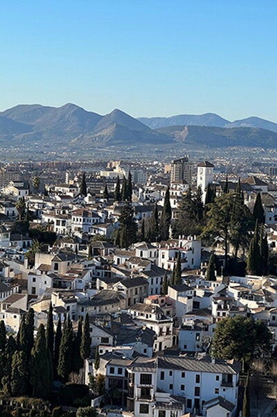 The Albaicín neighborhood of Granada, nestled against the Spanish Sierra Nevada