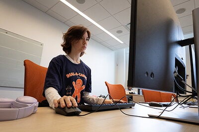 Student at computer in class