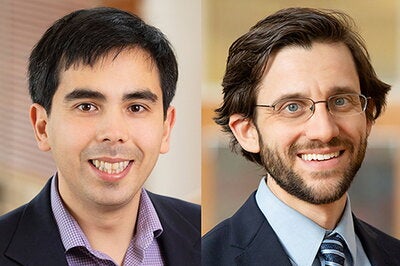 From left, co-authors Greg Howard, a professor of economics, and Russell Weinstein, a professor of labor and employment relations and of economics