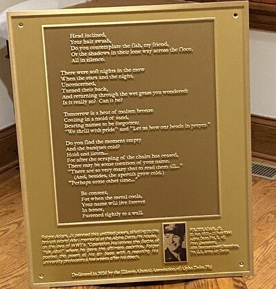 plaque featuring Adam's poem