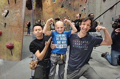 Koschmann with climbing participants