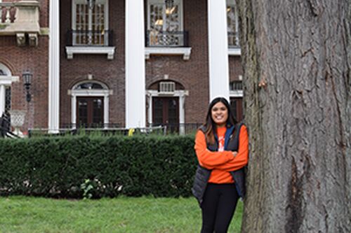 Megan Resurreccion poses in front of the English Building