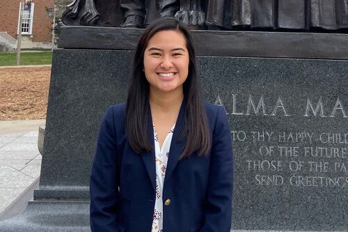 LAS junior Megan Choi poses for photo in front of Alma Mater