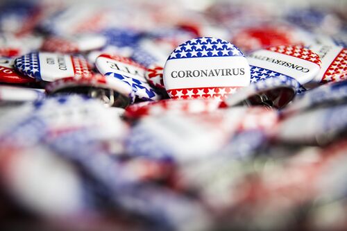 Political buttons marked with coronavirus 