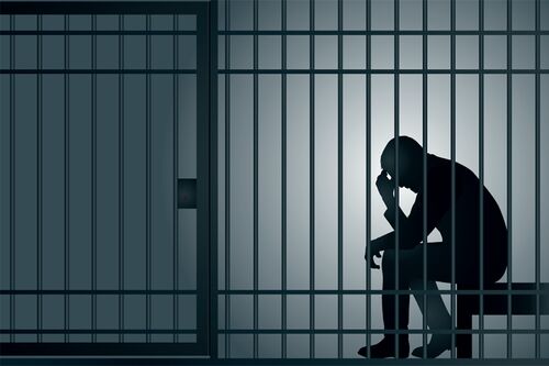 Stock illustration of man behind prison bars