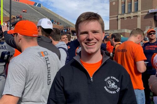 LAS student poses for photo inside Memorial Stadium