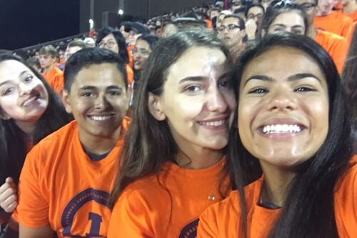 Daria Zelen with friends at a football game