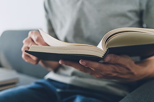 Open book on lap