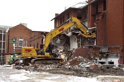 Excavator demolishes Illini Hall