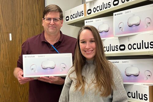 Randall Sadler and Tricia Thrasher display VR headsets